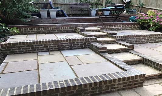 Paving and brickwork for a sloped garden in East London